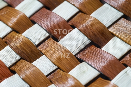 Brown takitahi weave - New Zealand flax weaving - Closeup of the woven strands