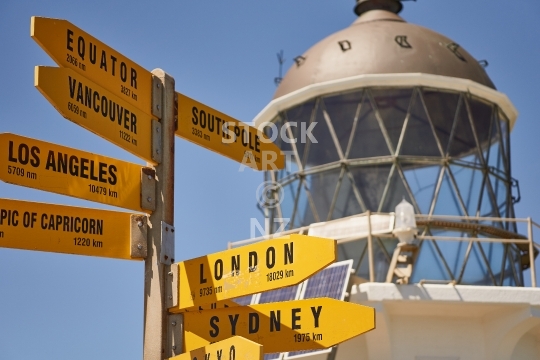 Cape Reinga signpost - Northland NZ - Famous distance sign with the light house at New Zealands northernmost tourist destination