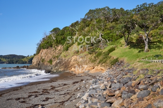 Helena Bay - Northland NZ - Nice sandy beach along Old Russell Road, with rocks and Pohutukawa trees