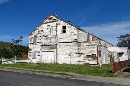 Old corrugated iron building in New Zealand  - Quirky old heritage house near Ruatoria in the East Cape region of New Zealand - lower resolution quality photo, ideal for web use