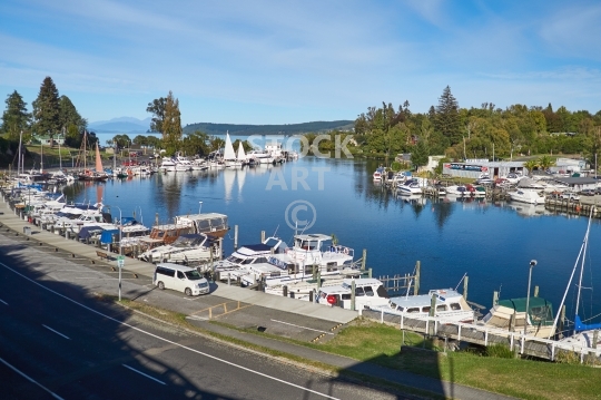 Taupo marina with yachts and motor boats, New Zealand - View of Redoubt Street from Riverside Park